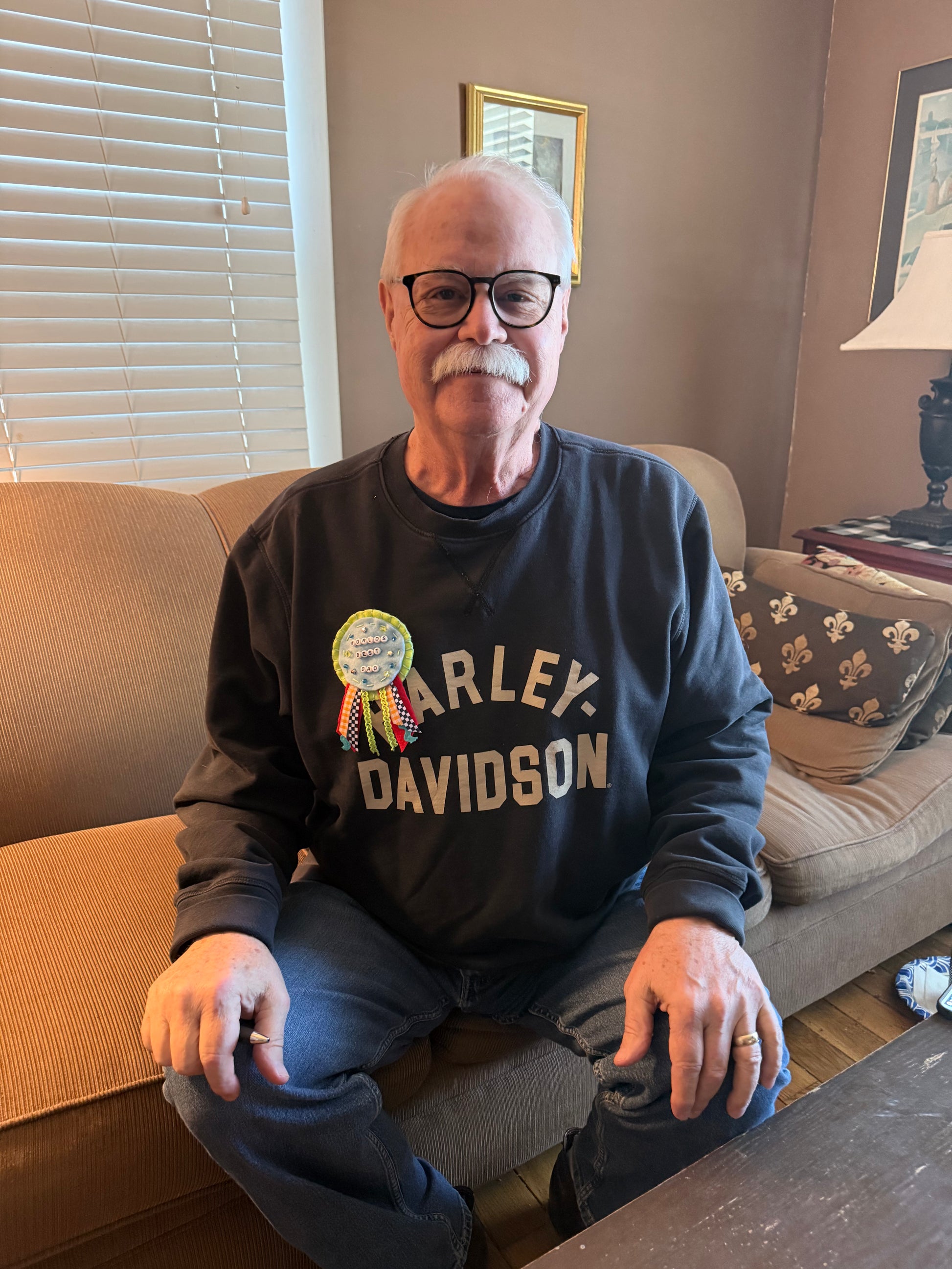 The world's best Dad (my dad) wearing his "Worlds Best Dad" award! 